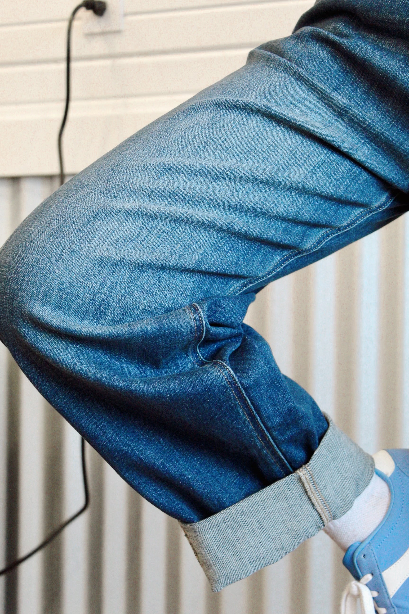 High rise relaxed tapered dark wash barrel