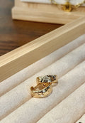 Gold hoops with textured northstar Huggies