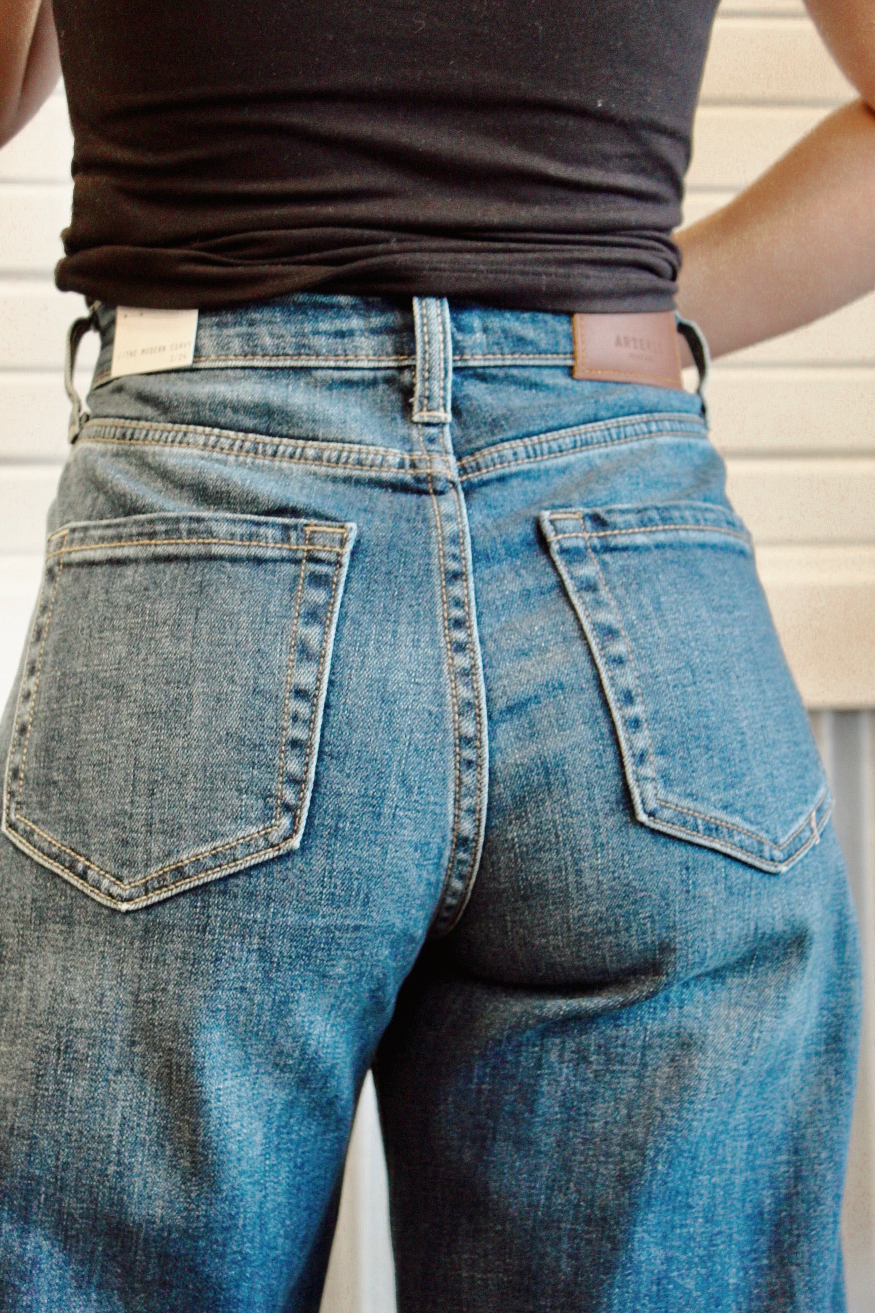 High rise relaxed tapered dark wash barrel